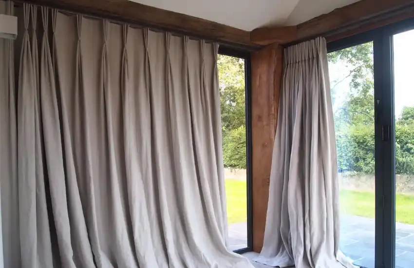 Use Layered Or Thermal Curtains