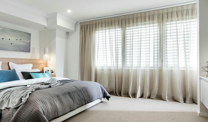 Benefits Of Covering An Entire Wall With Curtains